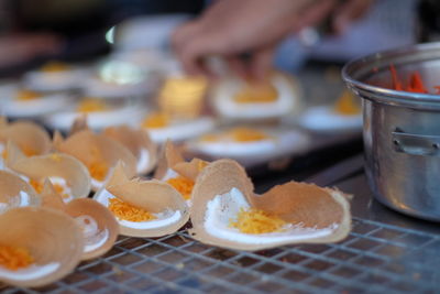 Close-up of food on metal grate