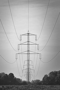 Electricity pylon against sky
