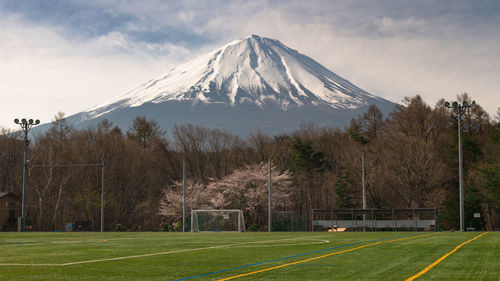 Scenic view of snowcapped mountains against sky