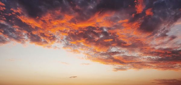 Low angle view of clouds in sky during sunset