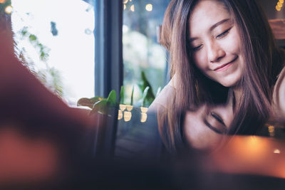 Portrait of a smiling young woman