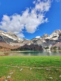 Scenic view of snowcapped mountains against sky