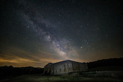 Scenic view of building against sky at night