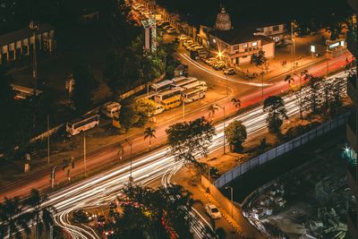 High angle view of light trails on city street at night