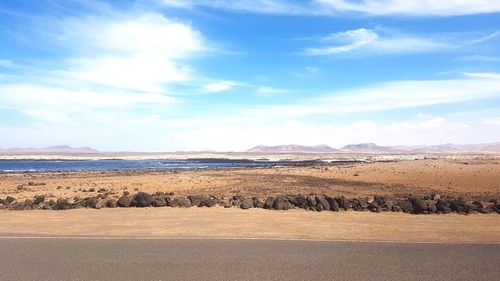 Scenic view of beach against sky