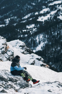 Man skiing on snow