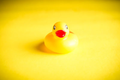 Close-up of yellow toy on table