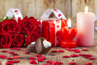 Close-up of red roses on table