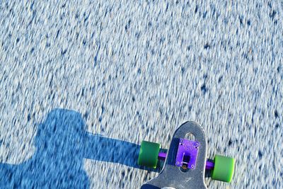 High angle view of skateboard on street