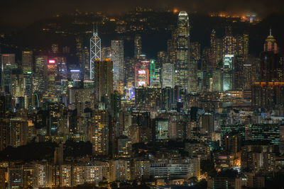 Aerial view of illuminated cityscape at night