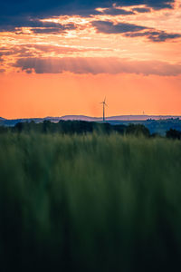 Scenic view of landscape against sky during sunset