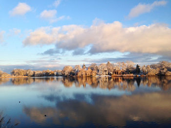 Reflection of clouds in calm lake