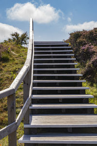 Low angle view of staircase against sky
