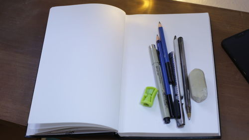 High angle view of books on table