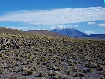 Scenic view of volcanic landscape against sky