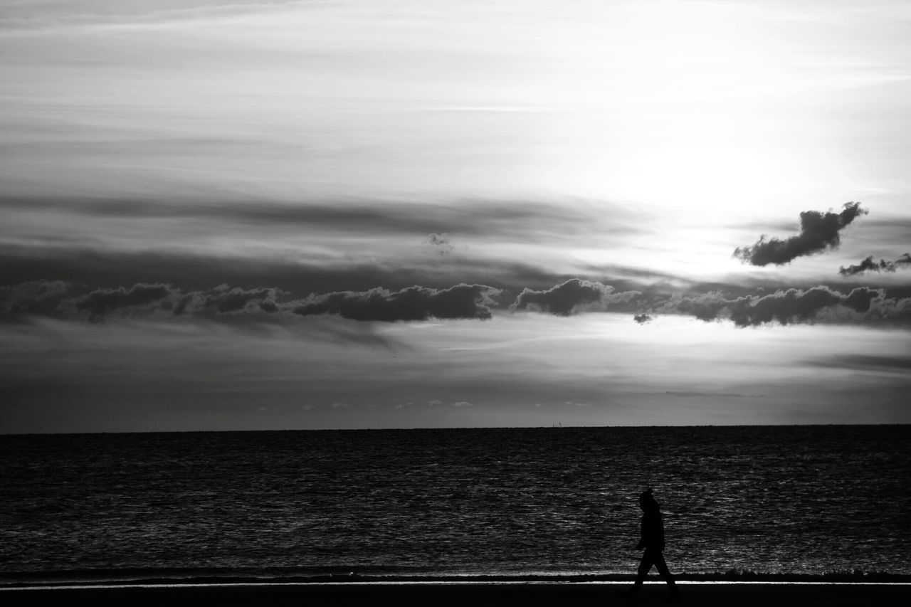 Man walking on beach