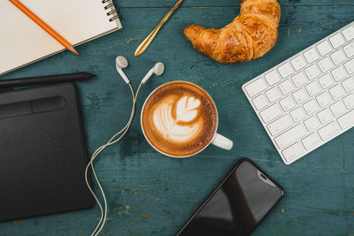 High angle view of coffee cup on table