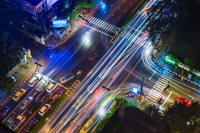 High angle view of illuminated city street at night