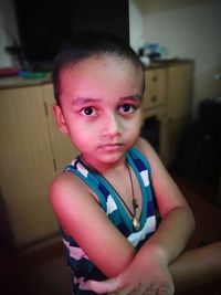 Portrait of cute boy at home