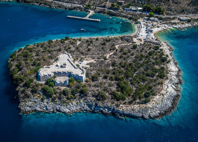 High angle view of sea and buildings