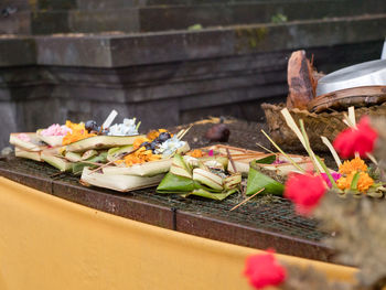 Sacrifice oblation, traditional offerings for gods in buddhist temple, bali. sacrifice, oblation 