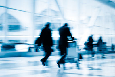 People walking on road in city