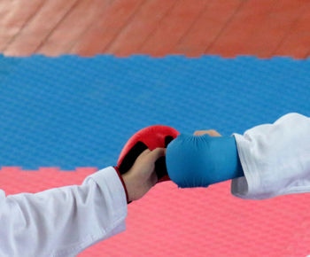 Close-up of red shoes on tiled floor