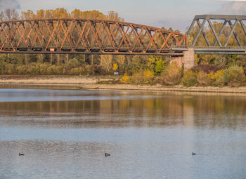 Bridge over river against sky