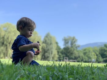 Cute boy on field