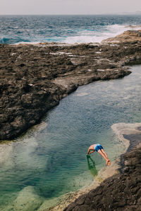 High angle view of rocks on beach