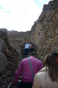 Woman standing on rock formation