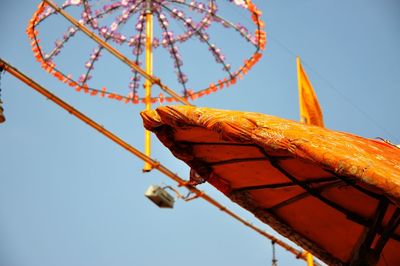 Low angle view of bird against clear sky