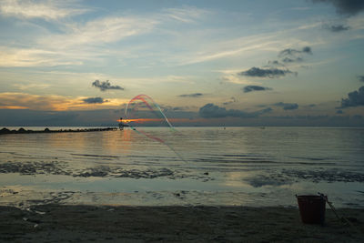 Scenic view of sea at sunset