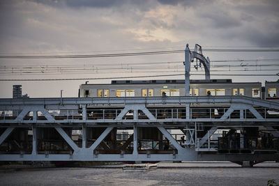 Bridge over river against sky