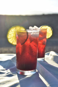 Close-up of drinks on table at desert