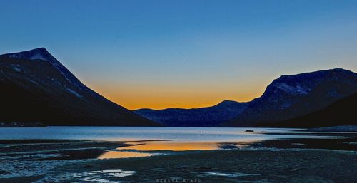 Scenic view of mountains at sunset