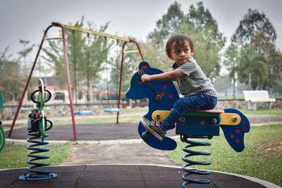 Boy playing at playground