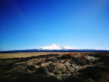 View of mountain range against cloudy sky