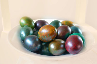 Close-up of multi colored easter eggs on table