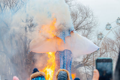 Panoramic view of people on fire