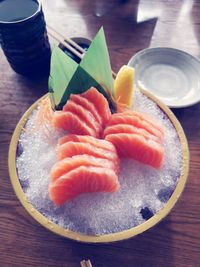 High angle view of fruits in plate on table