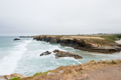 Scenic view of sea against clear sky