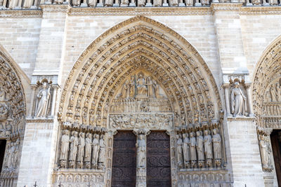 Entrance portal of cathedral notre dame, paris, france