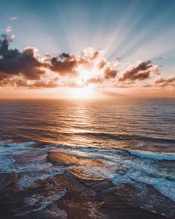 Scenic view of sea against sky during sunset