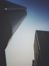 Low angle view of modern buildings against clear sky