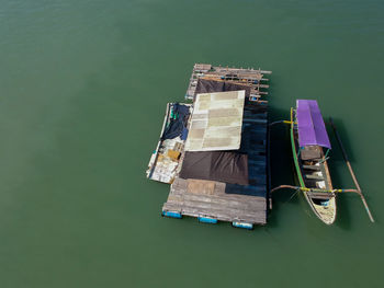 High angle view of boat floating on lake