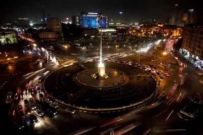 High angle view of light trails on road in city