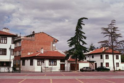 Houses and buildings against sky