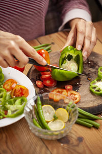 Midsection of woman preparing food