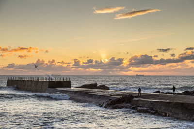 Scenic view of beach during sunset